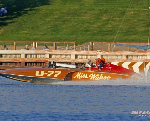 Old wooden hydroplane on the lake